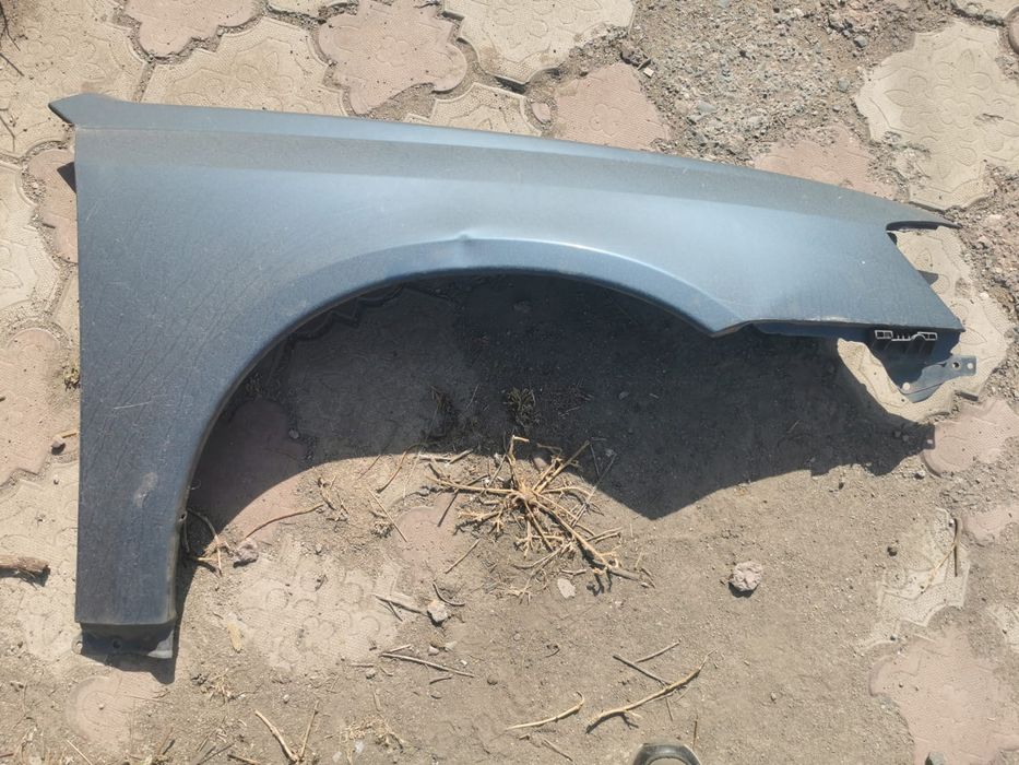 Продам крыло на Субару Легаси