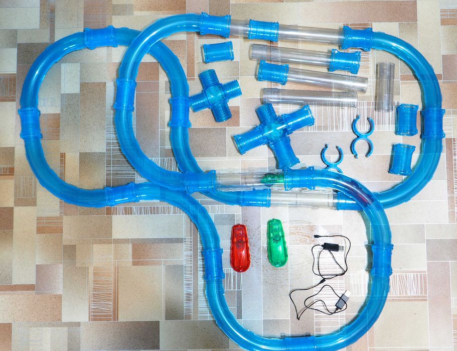 Гибкий автотрек с машинками "Гонки в трубе