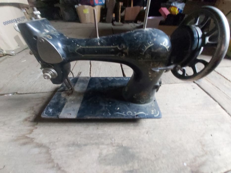 Masina de cusut Singer