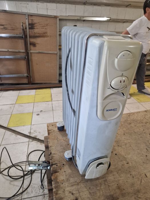 Масляный обогреватель