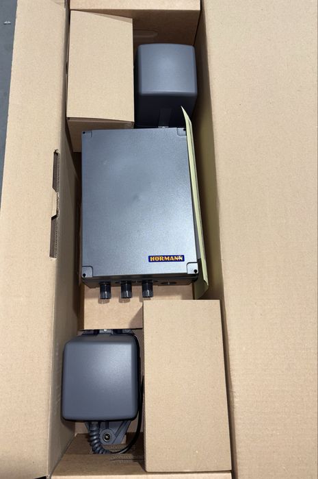 Задвижване Хьорман за отваряеми двукрили  портални врати на панти