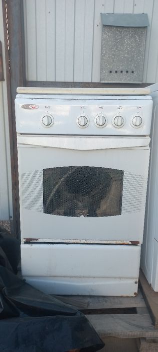 Продам газовую плиту,призводство лада.