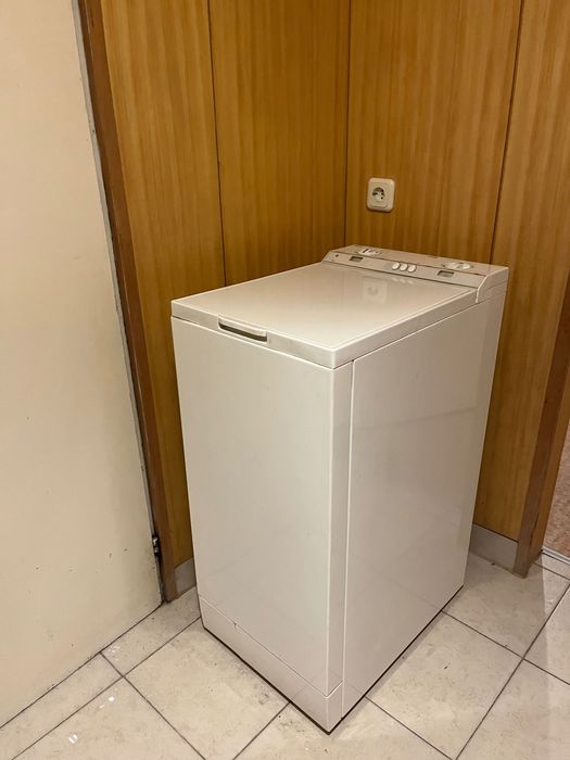 Пералня с горно зареждане