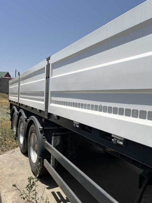 В продаже Новый Полуприцеп бортовой контейнеровоз UzAutoTrailer 12,5 м