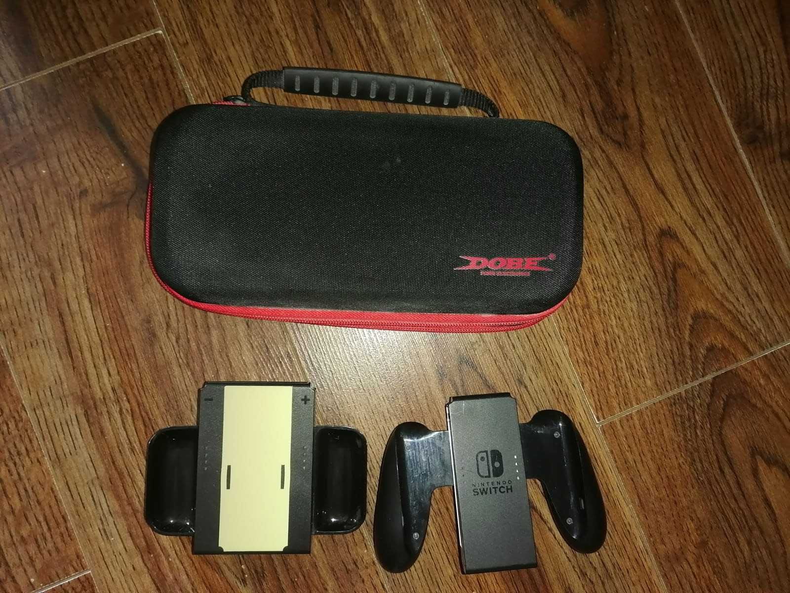 Vand  Nintendo Switch + geantă Dobe + 6 jocuri + accesorii