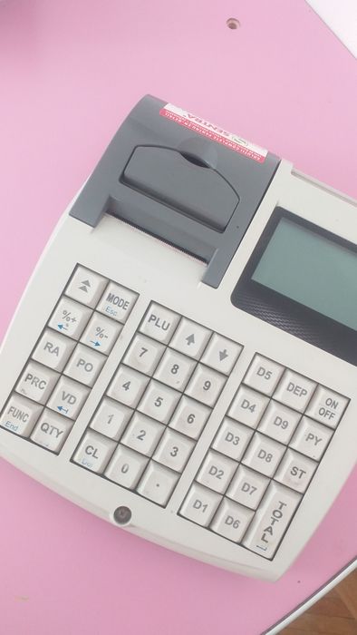 Casă de marcat în stare bună,utilizată