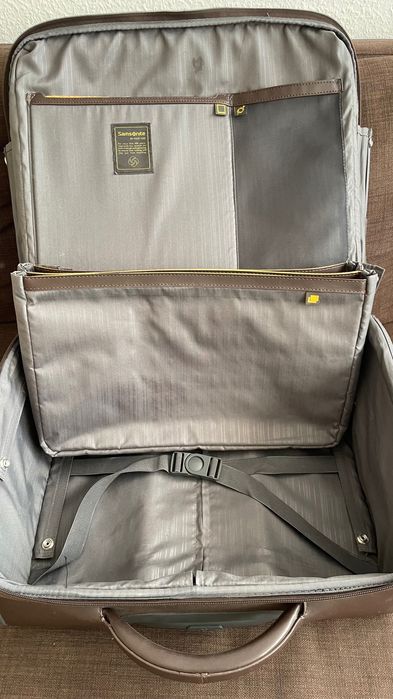 Малък кожен куфар на колелца Samsonite
