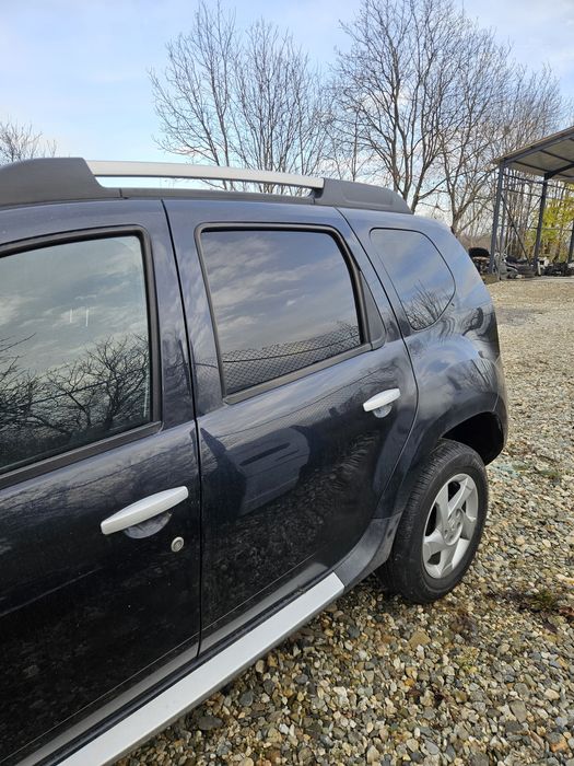 Geam usa stanga spate Dacia duster an 2013