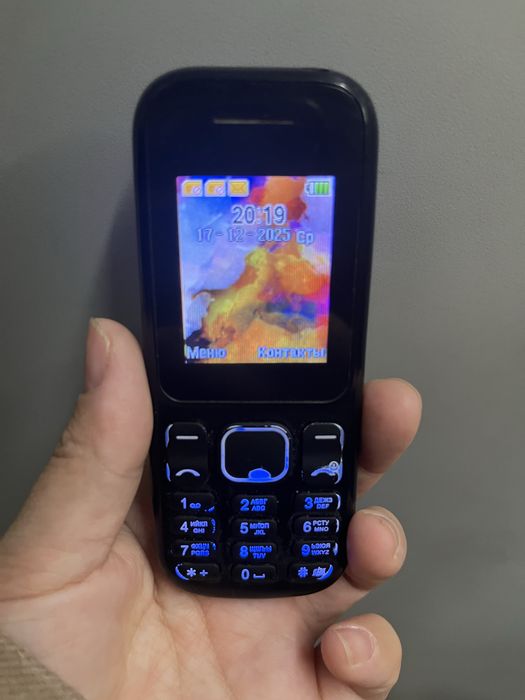 Кнопочный телефон