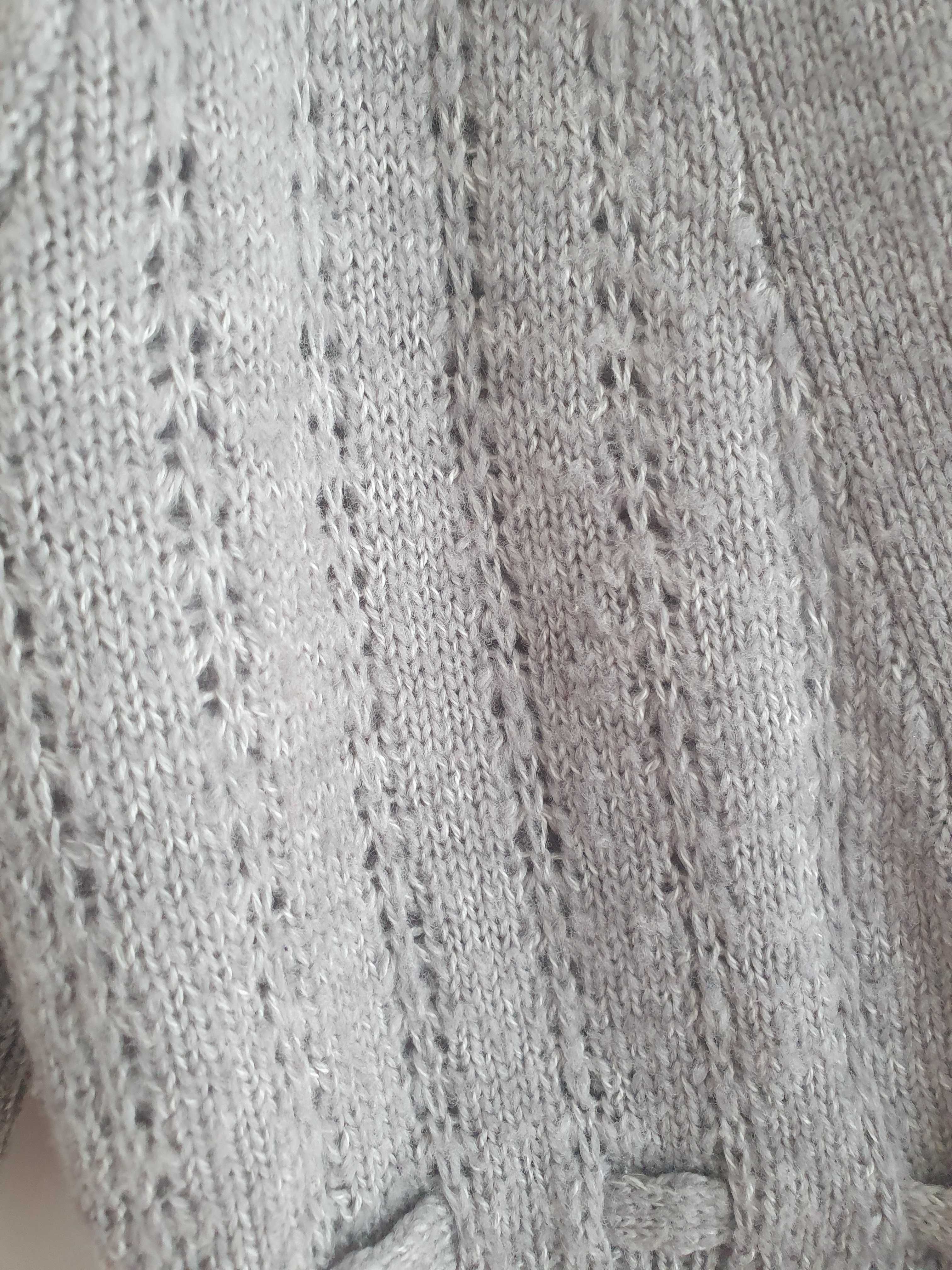 плетена жилетка.
