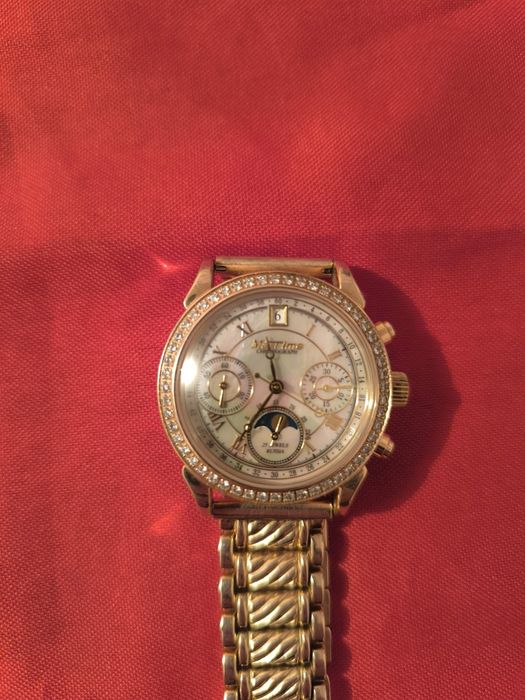 Продам  золотые часы Мактайм