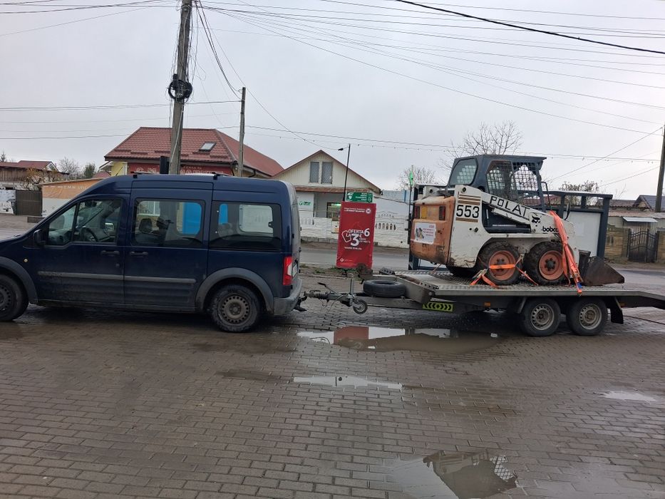 Mini excavator și incarcator