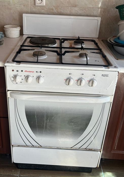 Продам комбинированную газовую плиту