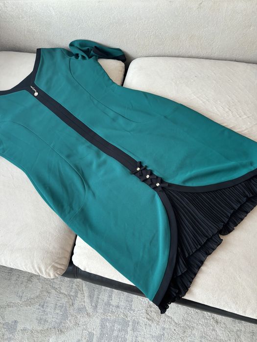 Продам очень красивое платье в размере 50р. Производство Турция.