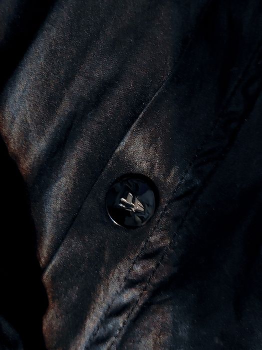 Geaca New Era două culori.