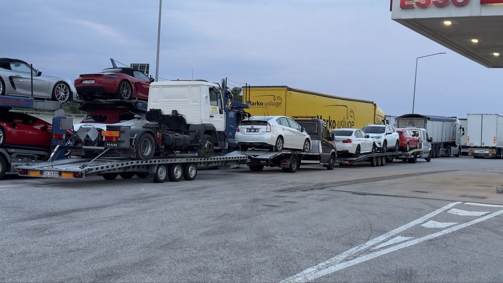 Transport auto pe platformă România-Italia și Italia-România