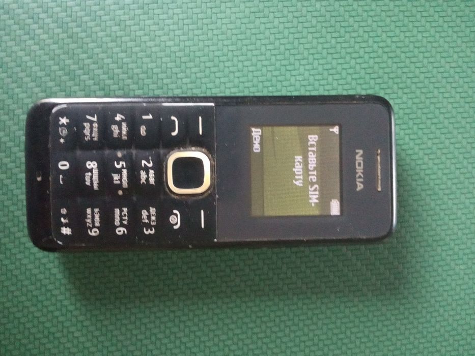Телефон кнопочный Нокиа.