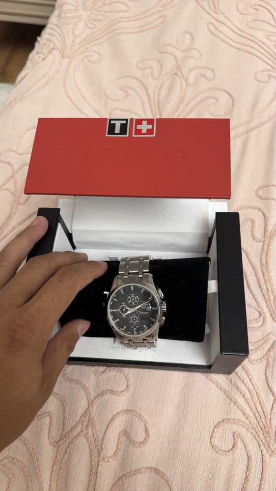 Часы TISSOT T035.627. Оригнал куплен в Корее.