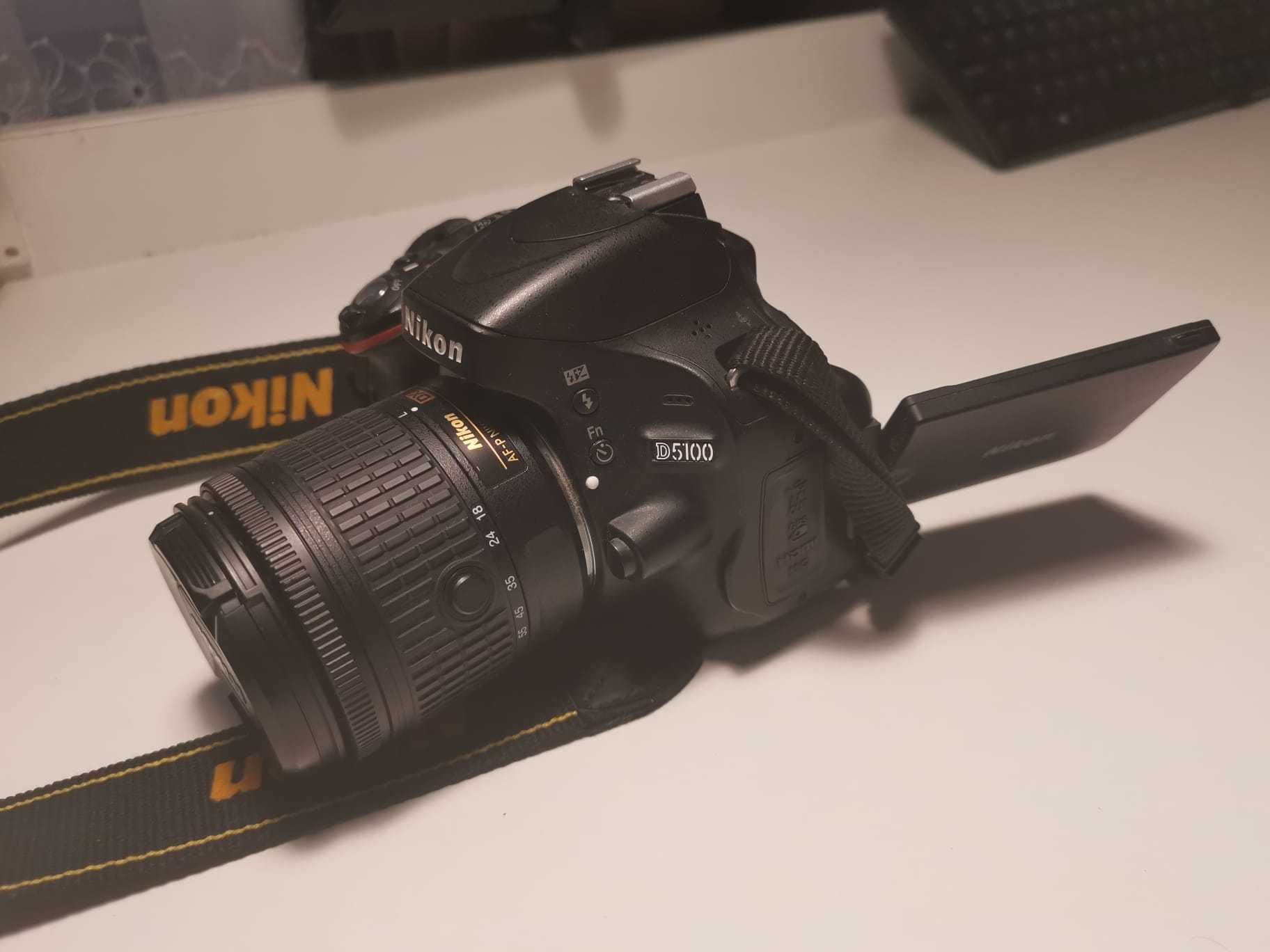 Nikon D5100 + 2 obiective + accesorii – doar 9425 cadre