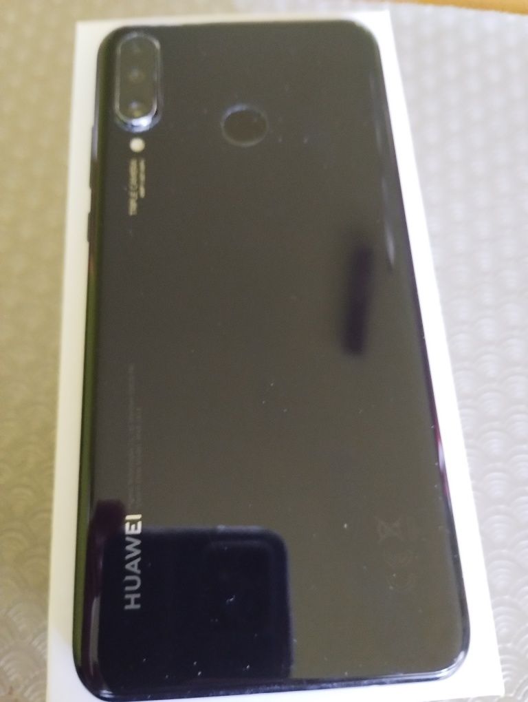 Huawei p30 lite със подарък нов кейс и безжични слушалки