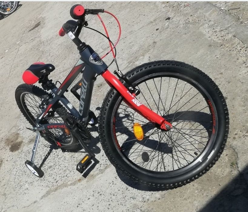 Bicicleta copii Corelli 20", 7 viteze, culoare negru-rosu + casca+roti