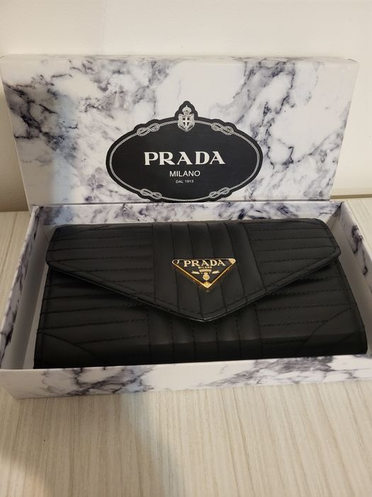 Portofel Dama nou la cutie