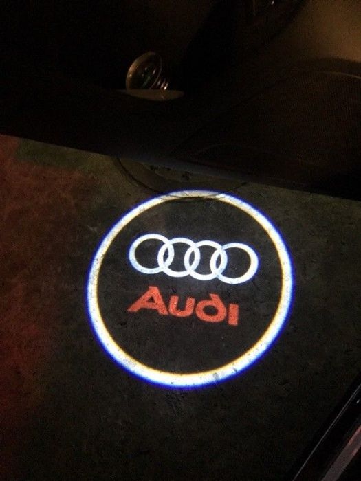 Proiectoare Logo Portiere Audi (Logo Audi + Audi Text)