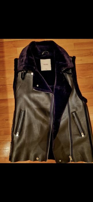 Vesta din blanita artificiala