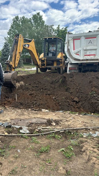 buldoexcavator - basculante 8x4 de inchiriat