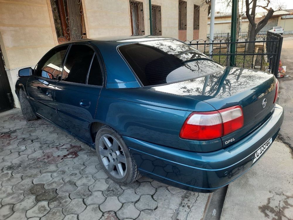 Opel omega full 9000$