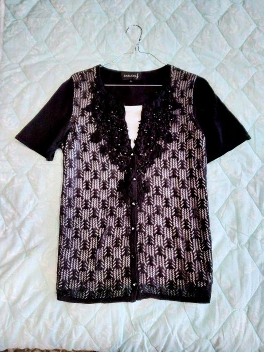 Блузка женская, трикотажная XL
1 500 тг.