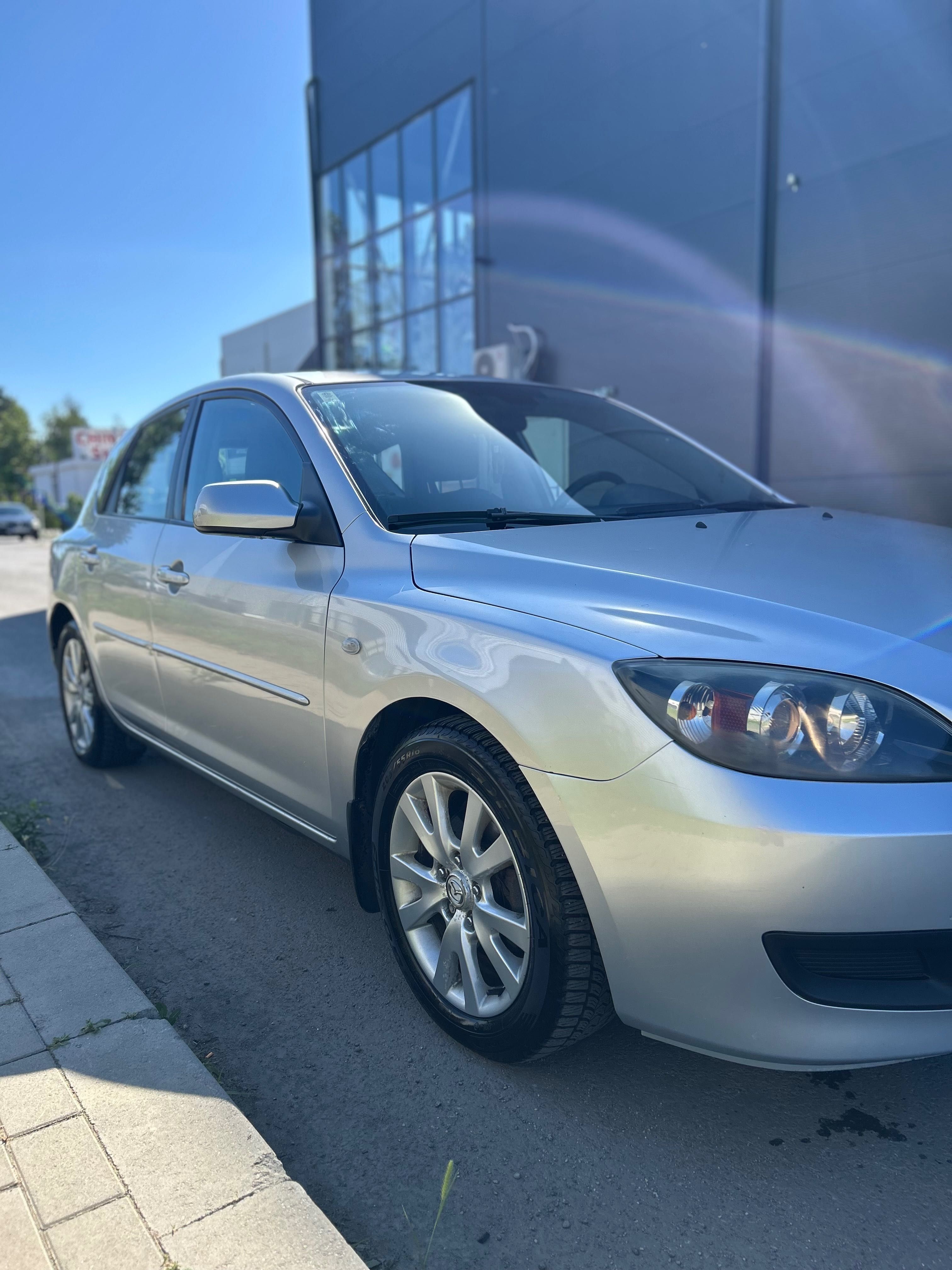 Mazda 3  1,6 benzină .