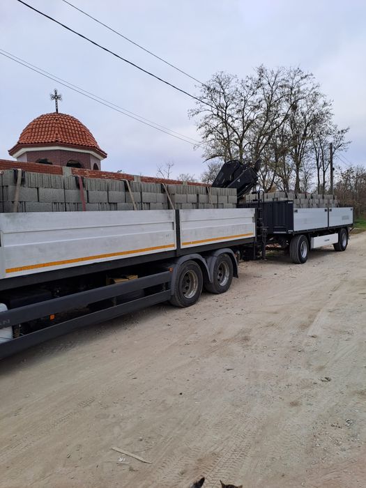 Transport materiale construcții cu macara