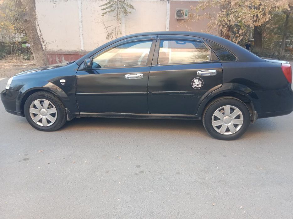 Lasetti 1.8 sotiladi navarotlari bilan Ласетти 1.8 продам срочно с нав