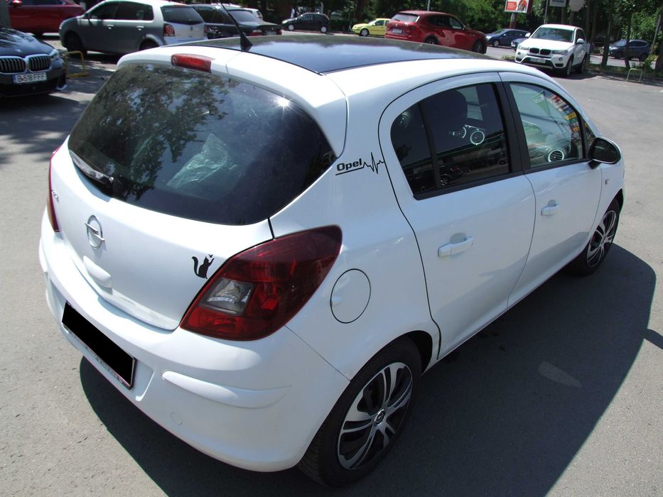 Vand Opel Corsa D Color Edition , 1.2 16V , set anvelope iarna - vara