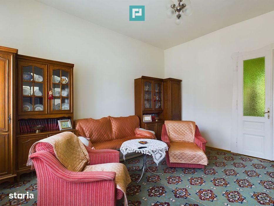 Casă individuală cu teren de 1100 mp și 3 apartamente în curte