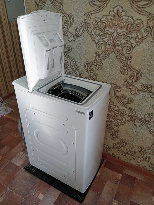 Стиральная машинка автомат Midea вертикал загрузка 1,5 г в пользовании