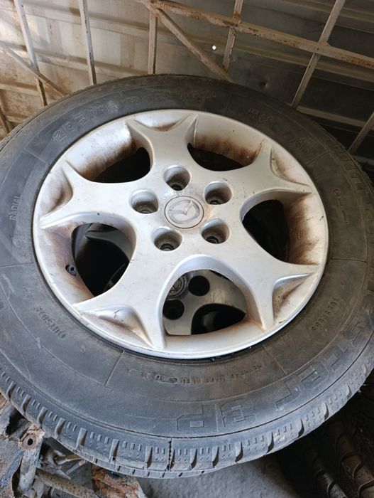 Продам колеса в сборе стояли на Мазда птичка привозные с Европы