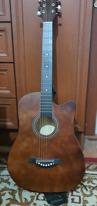 Gitara yangi pachti ishlatilmagan