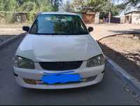 Mazda familia Б/У машина продаю.