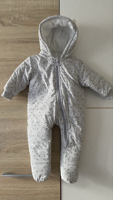 Combinezon îmblănit 6–12 luni, nou, cu fermoar