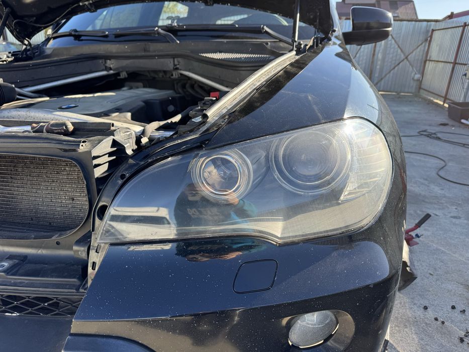 Far stanga  bmw x5 e70 bi-xenon NFL