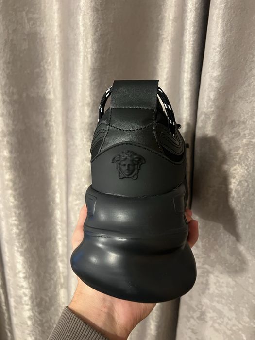 Versace chain reaction