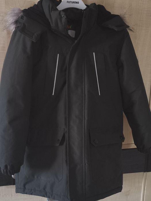 Продам куртку на мальчика 10л размер 140