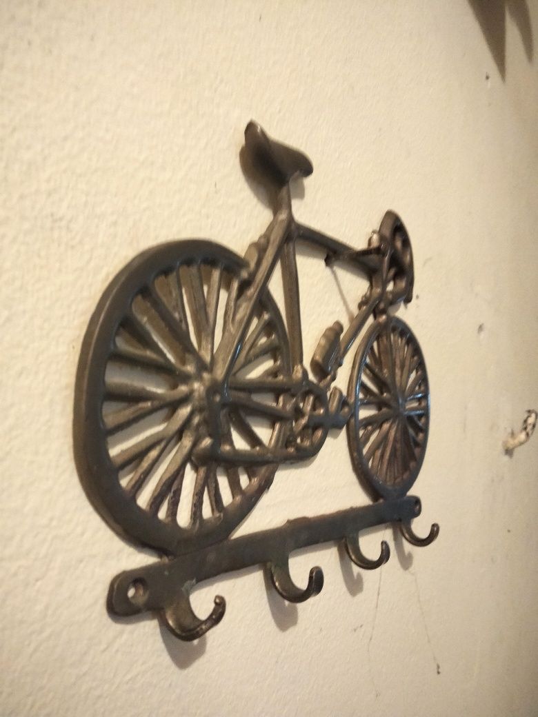 Cuier, bicicleta bronz