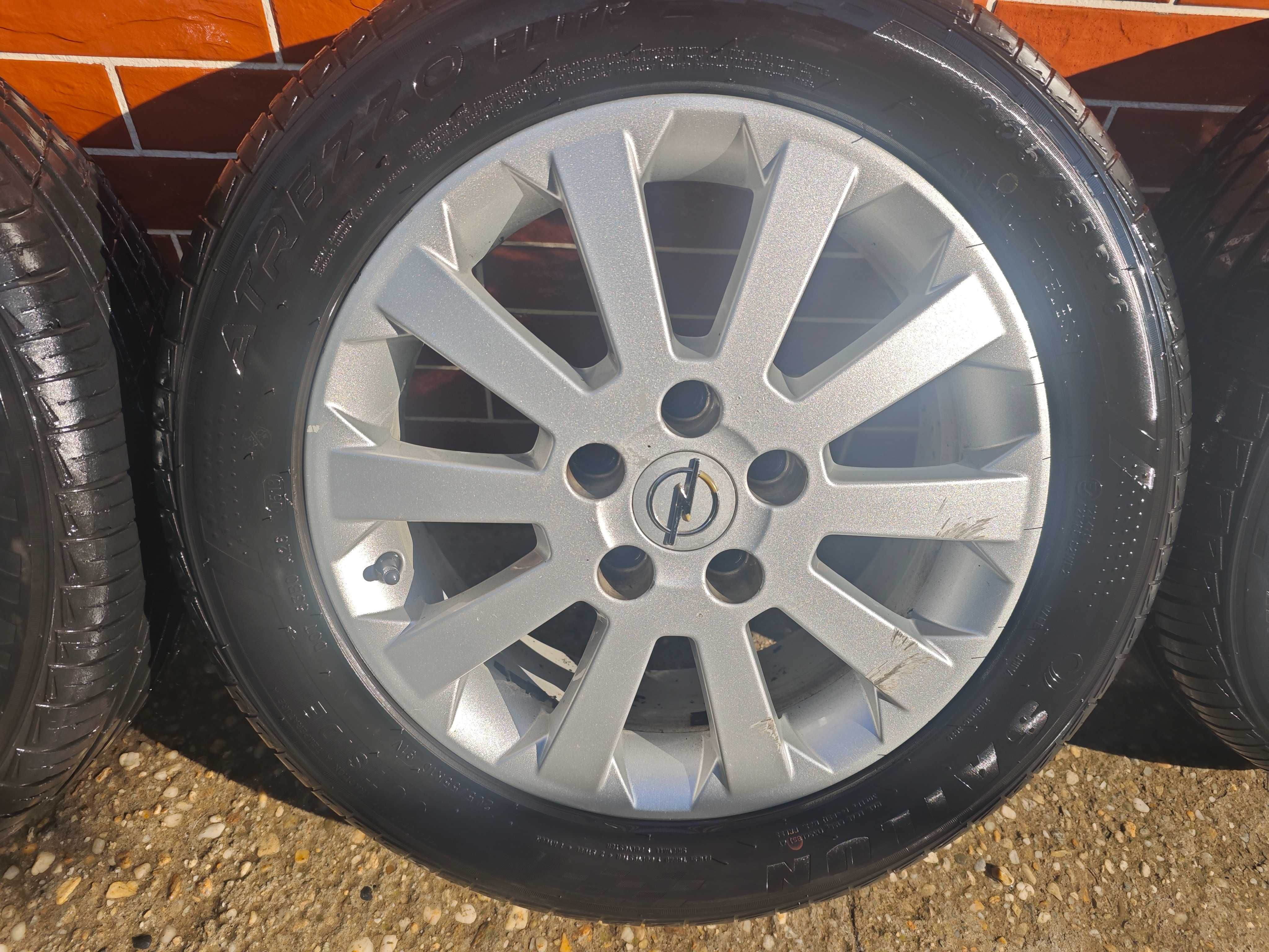 Jante originale Opel 5X110 cu anvelope bonus 240 km/h 91V