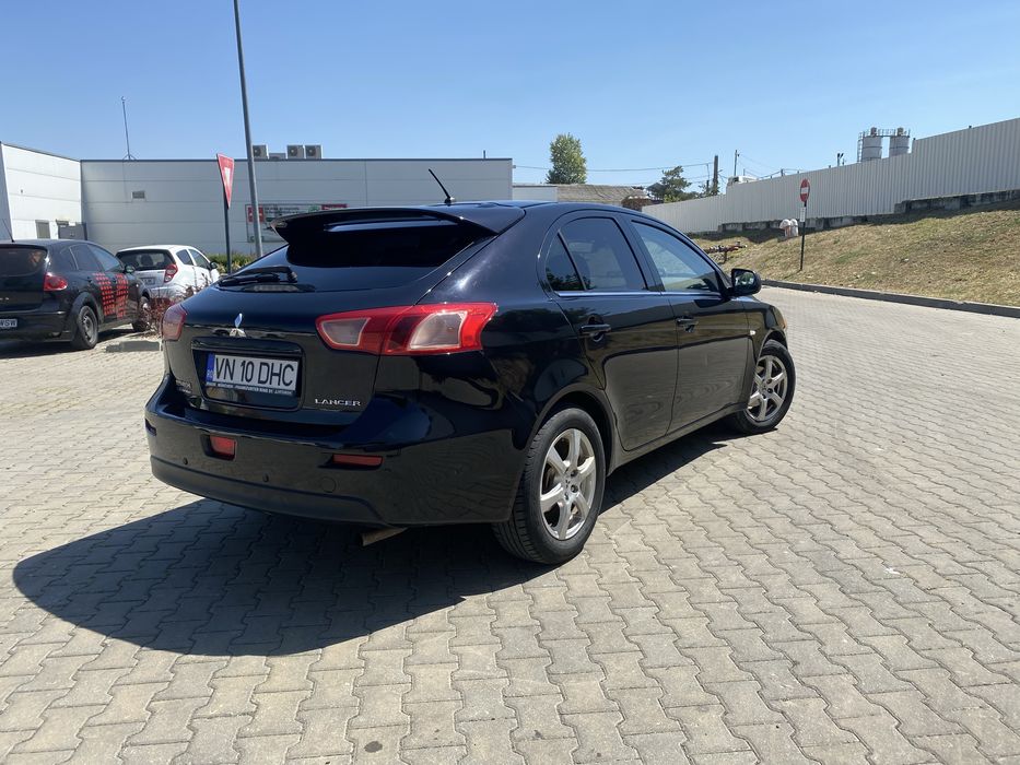 Mitsubishi Lancer - 1.6i - 2010 - xenon - carte service
