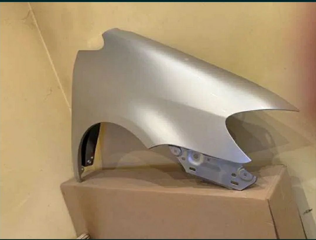 Aripa dreapta fata NOUA vopsita gri argintiu LA7W VW Touran 2007 -2011