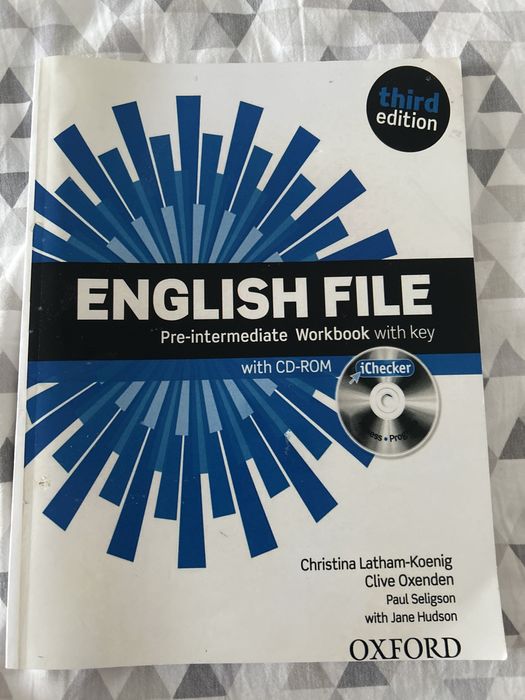 English file pre-intermediate , workbook , students book .
