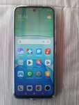 Телефон Xiaomi Redmi13